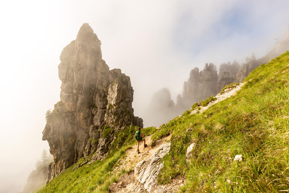 Hiking beneath Cima D'Oltro. The last day of crossing the Pale di San Martino range on Alta Via 2 in the Italian Dolomites