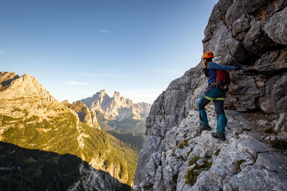 Top Via Ferratas Around Cortina d'Ampezzo In The Italian Dolomites 9 Climber looking towards Monte Cristallo from the route along the via ferrata Alfonso Vandelli in the Sorapiss range in the Italian Dolomites