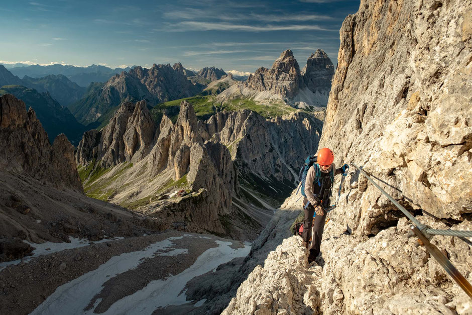 A climber on the via ferrata Merlone in the Italian Dolomites